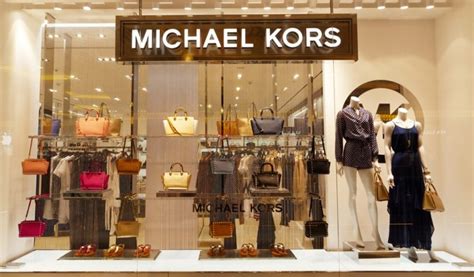 what companies did michael kors buy|capri holdings limited brands.